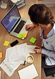 Businesswoman working on laptop