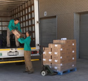 Lifting packages into truck