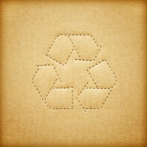 Cardboard box background with recycle symbol