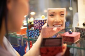 Woman Looking into Mirror